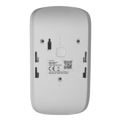 Dispositivo eletrônico branco com etiqueta e botão no centro