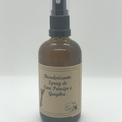 Frasco de spray desodorizante com rótulo de papel castanho e tampa preta