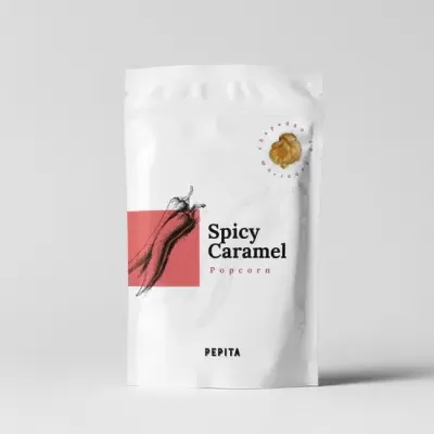 Embalagem branca com texto Spicy Caramel Paprica e ilustração de raiz