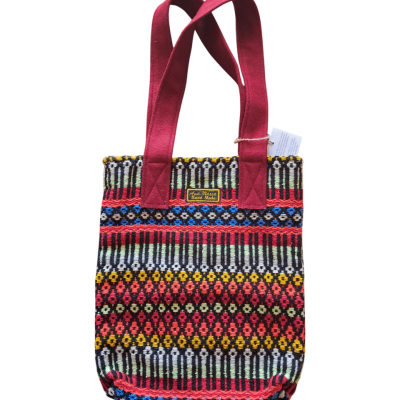 Saco tecido colorido com alças cor-de-rosa escuro e etiqueta Ana Maria Hand Made