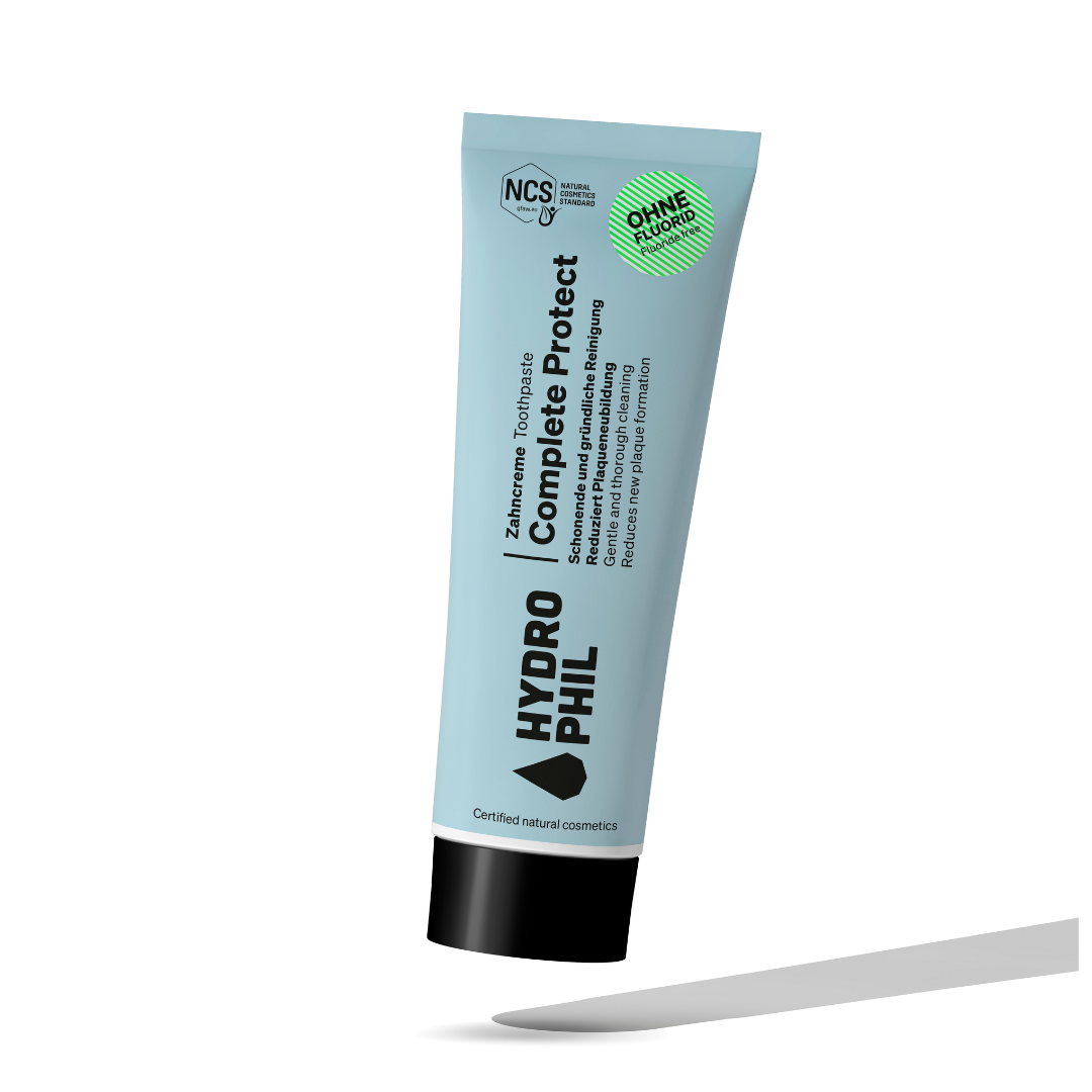 Pasta de Dentes Hydrophil Complete Protect - Sem Flúor Tubo azul claro de pasta dentífrica HydroPhil com tampo preto