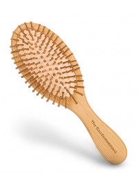 Escova de cabelo bambu FSC oval Escova de cabelo de madeira clara com cerdas e cabo gravado