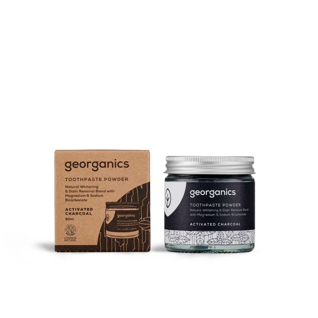 Pó Dentífrico Natural Georganics – Carvão Ativado Pó para pasta de dentes georganics com carvão ativado em embalagem de vidro e caixa de cartão