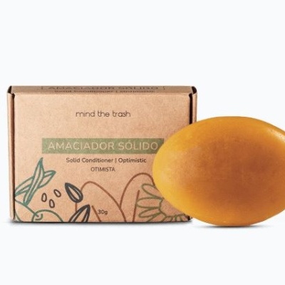 Condicionador sólido amarelo com embalagem de cartão ecológica