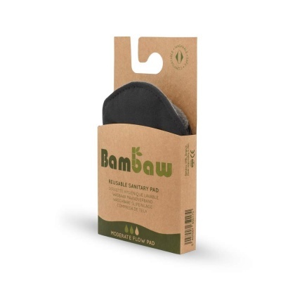 Embalaem de absorvente reusável Bambaw preto em caixa de cartão castanho com texto verde.