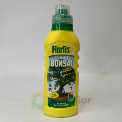 frasco amarelo de fertilizante para bonsais com tampa verde e rótulo com imagem de árvore bonsai