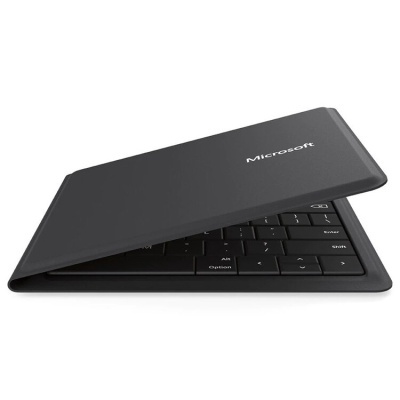 teclado Microsoft preto parcialmente aberto com tampa cinza