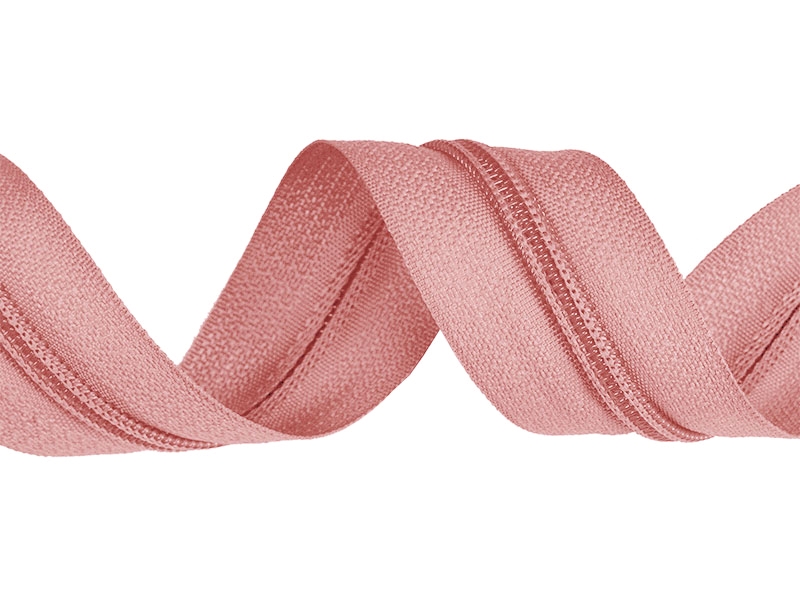 Fecho éclair rosa em tecido têxtil com textura ondulada