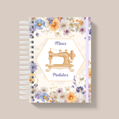 Caderno espiral decorado com flores e ilustração de máquina de costura