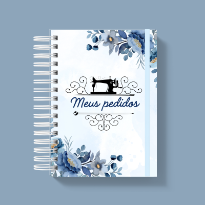 Caderno com capa floral azul e texto Meus pedidos