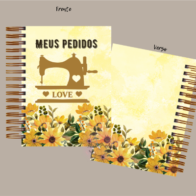 Caderno amarelo com máquina de costura e flores amarelas