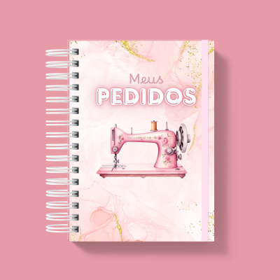 Caderno rosa com ilustração de máquina de costura e texto Meus PEDIDOS