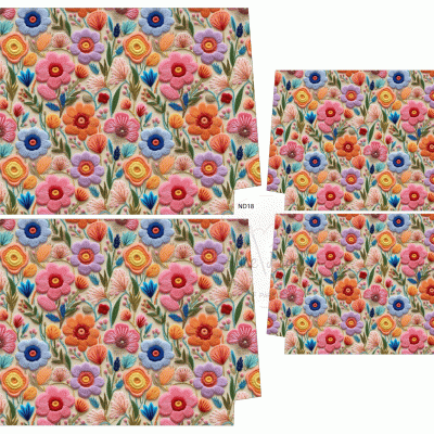 Guardanapos de tecido com padrão bordado floral colorido.