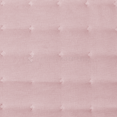 Tecido rosa claro com padrão de pequenos pompons