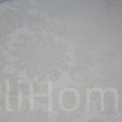 tecido decorativo branco com padrão floral em relevo