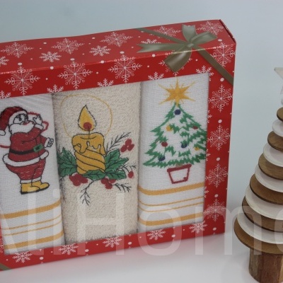 Conjunto de três panos de prato natalícios bordados em caixa vermelha com flocos de neve brancos