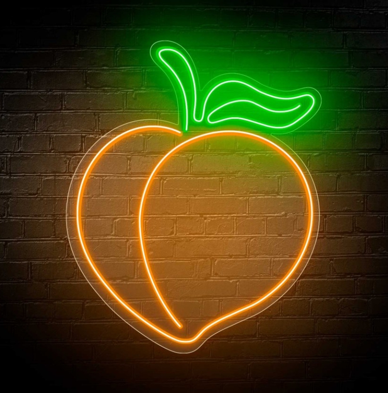 NeonLED | Pêssego Luz de neon em forma de pêssego em parede de tijolos