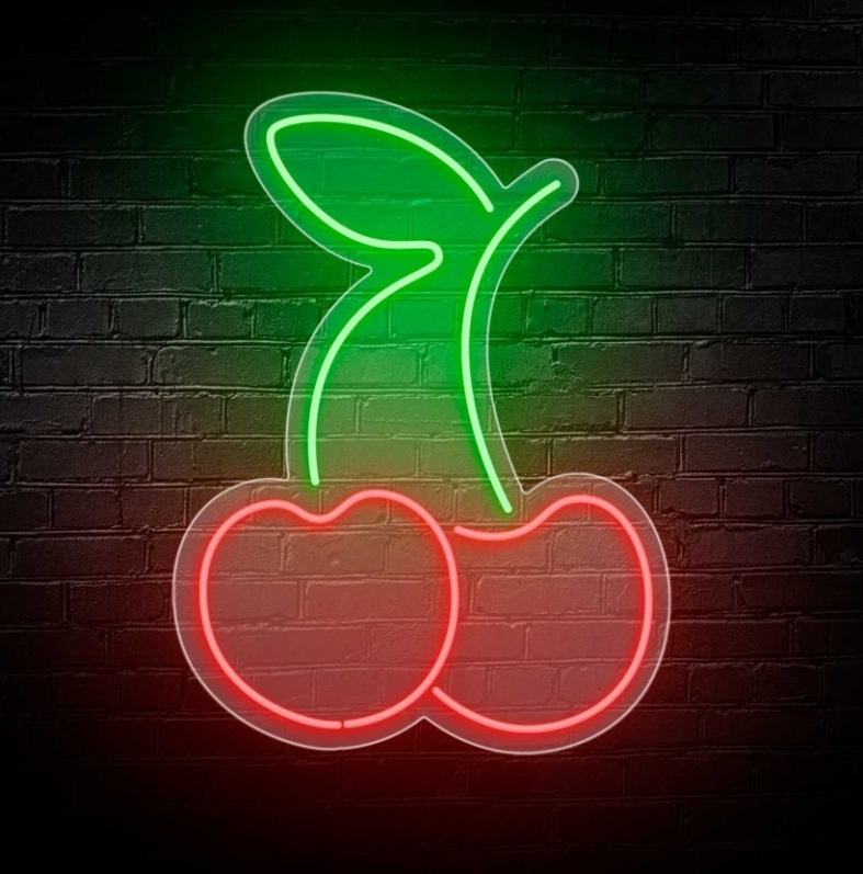NeonLED | Cereja Letreiro néon de cerejas vermelhas com caule e folha verde numa parede de tijolos