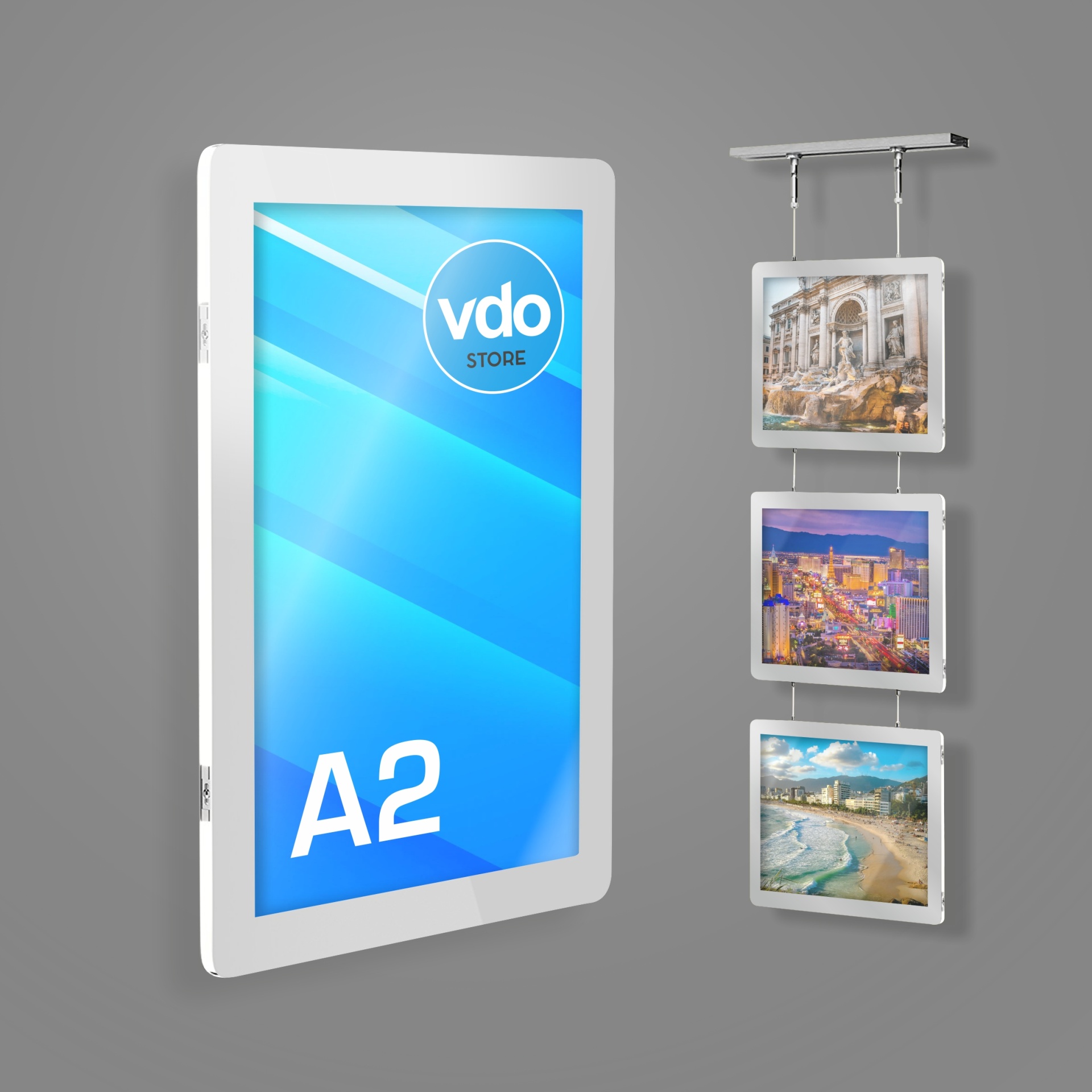 KIT Display LED Premium | A2 Painel digital branco com ecrã azul 'vdo STORE A2' e três quadros suspensos com fotografias de paisagens urbanas e praianas