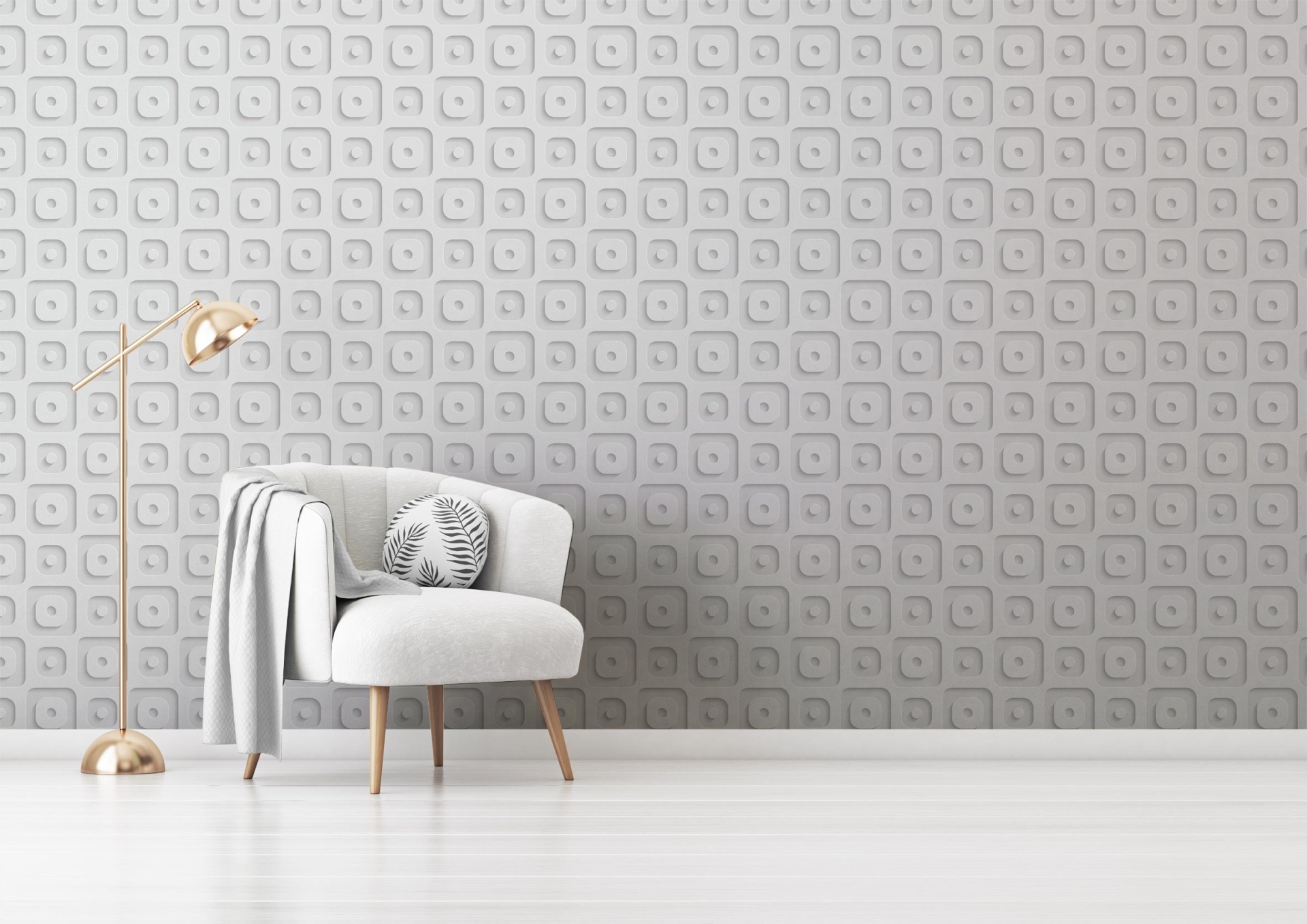013 Poltrona branca com almofada decorativa e manta cinzenta acompanhada por candeeiro dourado, frente à parede cinzenta com padrão geométrico