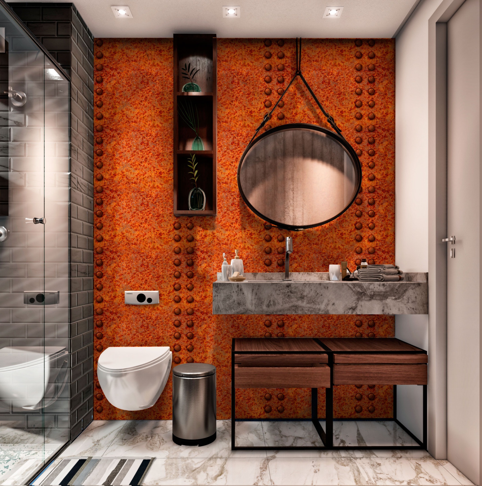 002 Casa de banho com parede laranja, sanita suspensa branca, espelho redondo, bancada cimento, banco madeira e chão de mármore.