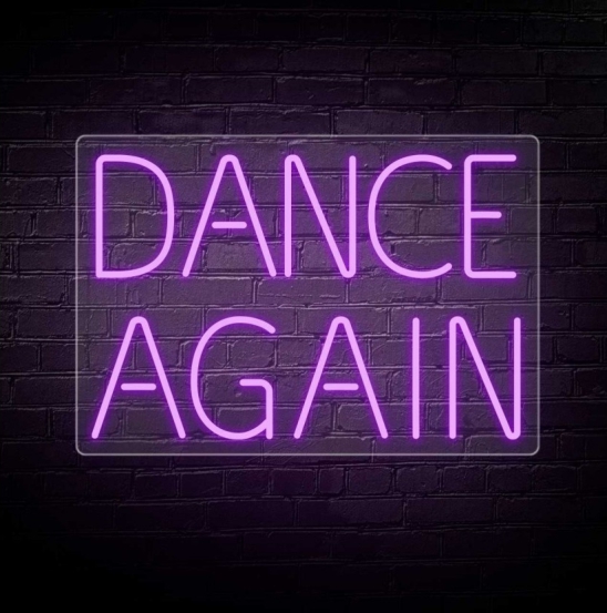 NeonLED | Dance Again Letreiro de néon rosa com as palavras 'DANCE AGAIN' sobre uma parede de tijolos escura
