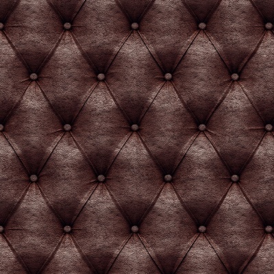 Textura de couro castanho escuro acolchoado com botões.