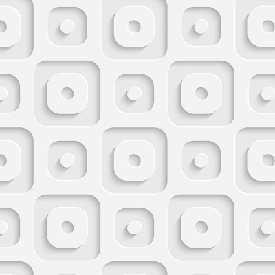 Colcha de retalhos com padrão floral em tons terrosos e bege sobre cama