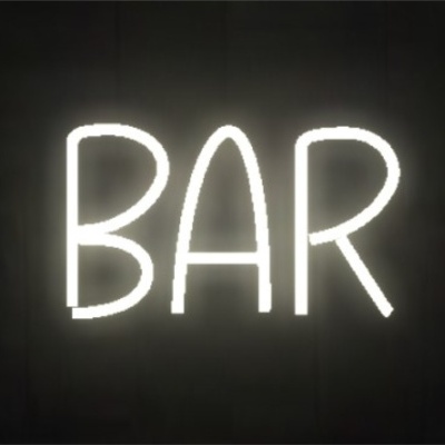 Letreiro luminoso de néon com a palavra BAR em letras brancas