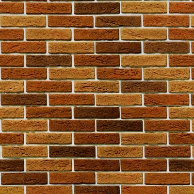 Parede de tijolos castanhos e alaranjados com junta clara