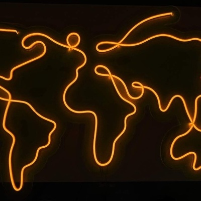 Mapa-múndi em néon laranja iluminado num fundo preto