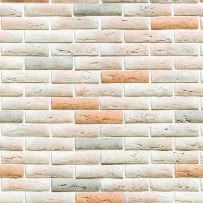 Parede com azulejos retangulares em tons creme, branco, cinzento e castanho, textura mate