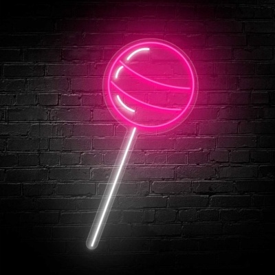 Neon art pirulito rosa em parede de tijolos pretos