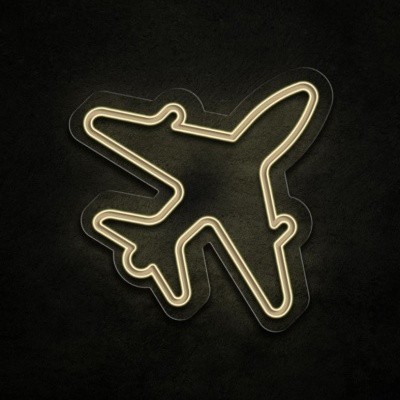 Neon em forma de avião com luz branca quente