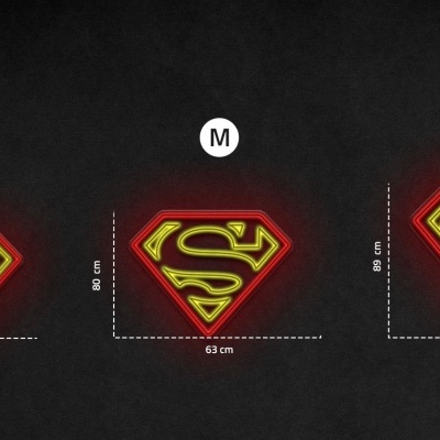 Sinais luminosos do símbolo do Super-Homem em três tamanhos sobre fundo preto