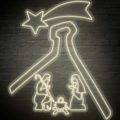 decoração de presépio natalino iluminado em fundo de parede de tijolos