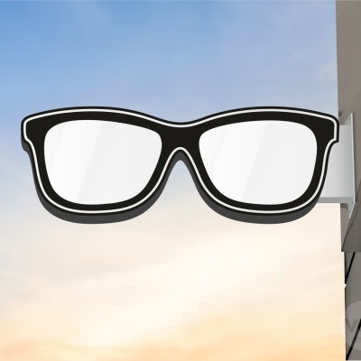Sinal exterior em forma de óculos preta com lentes brancas