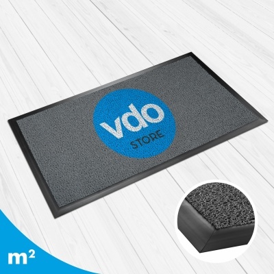 Tapete cinzento com círculo azul e texto 'vdo STORE'