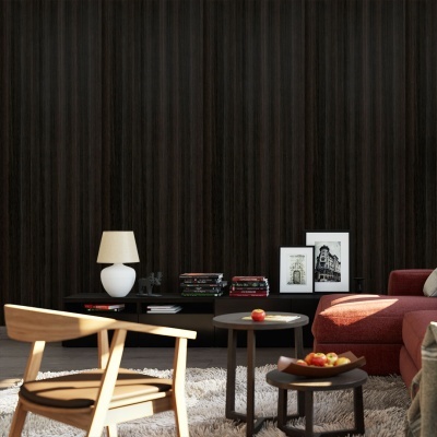 Sala de estar com sofá terracota, cadeira de madeira, mesa com maçãs, estante com livros, quadros em preto e branco e candeeiro de mesa branco