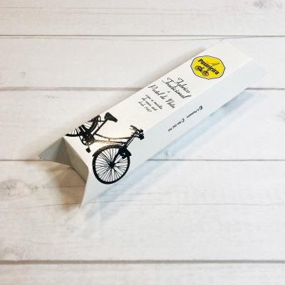 Caixa de embalagem branca com ilustração de bicicleta e texto em inglês para o Dia do Pai