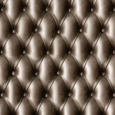 Estofado em couro castanho acolchoado com padrão chesterfield