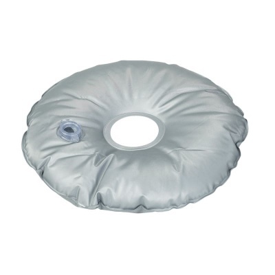 Colchão insuflável redondo prateado com buraco central e válvula de enchimento