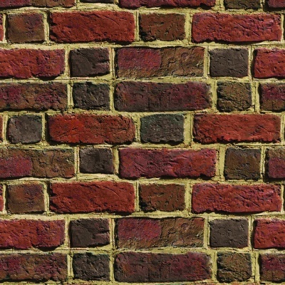 Parede de tijolos vermelhos e castanhos com argamassa amarela