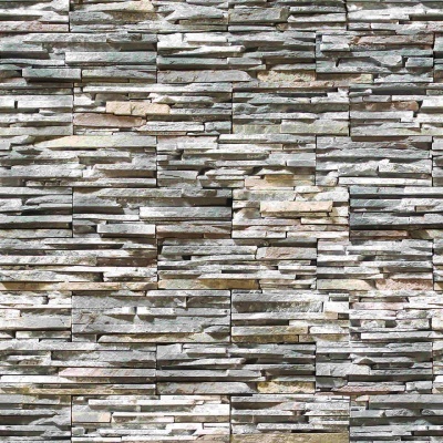 Parede de lajes de pedra empilhadas com tons cinza, bege e branco