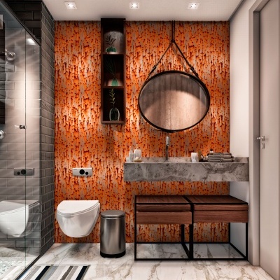 Casa de banho moderna com parede laranja texturada, espelho redondo e lavatório cinzento