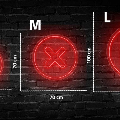 Três sinais luminosos circulares vermelhos com um X no centro em três tamanhos diferentes sobre parede de tijolos