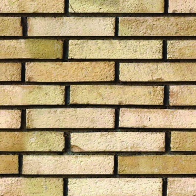 Painel de tijolos bege claro com textura rugosa e juntas escuras