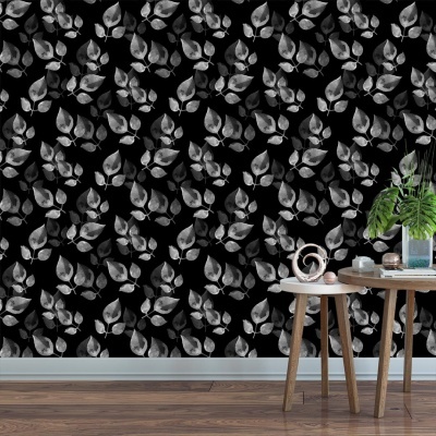 Papel de parede folhas cinzentas padrão sobre fundo preto com mesa e decoração