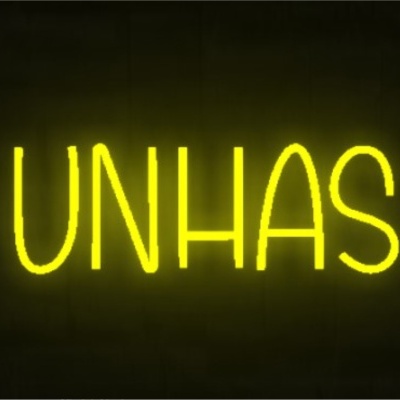 Neon amarelo com a palavra 'UNHAS' em fundo escuro