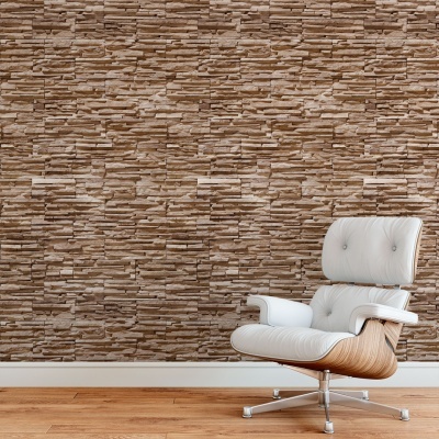 cadeira branca com estrutura de madeira clara em chão de madeira, parede de pedra decorativa